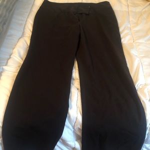 Women’s black dress slacks.